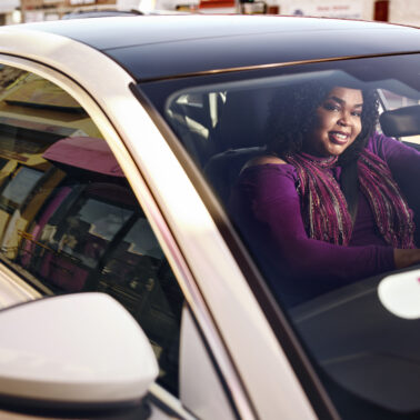 Women driving a car for Lyft