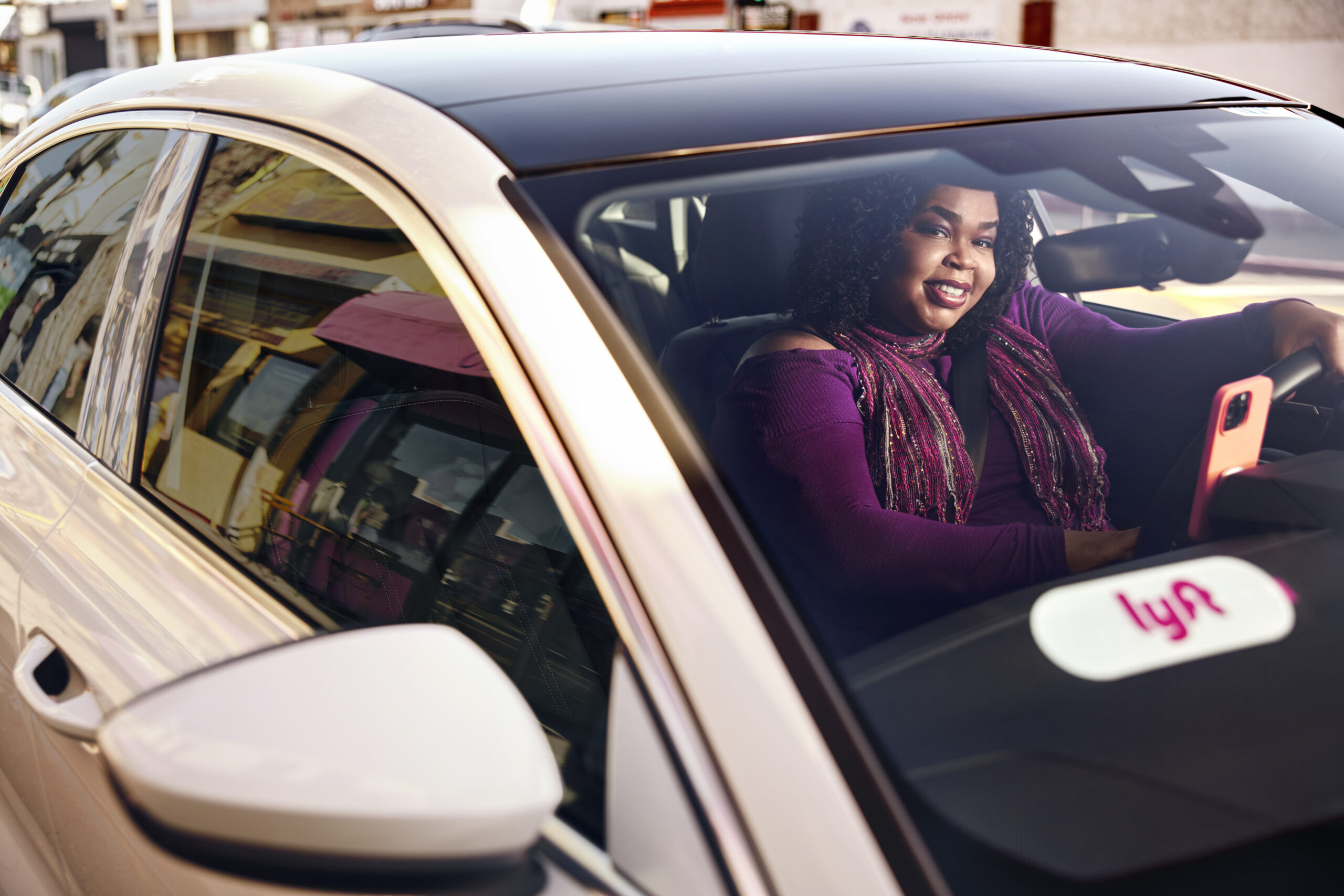 Women driving a car for Lyft